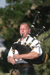 click on his photograph to see the page with the trophy and winners photograph